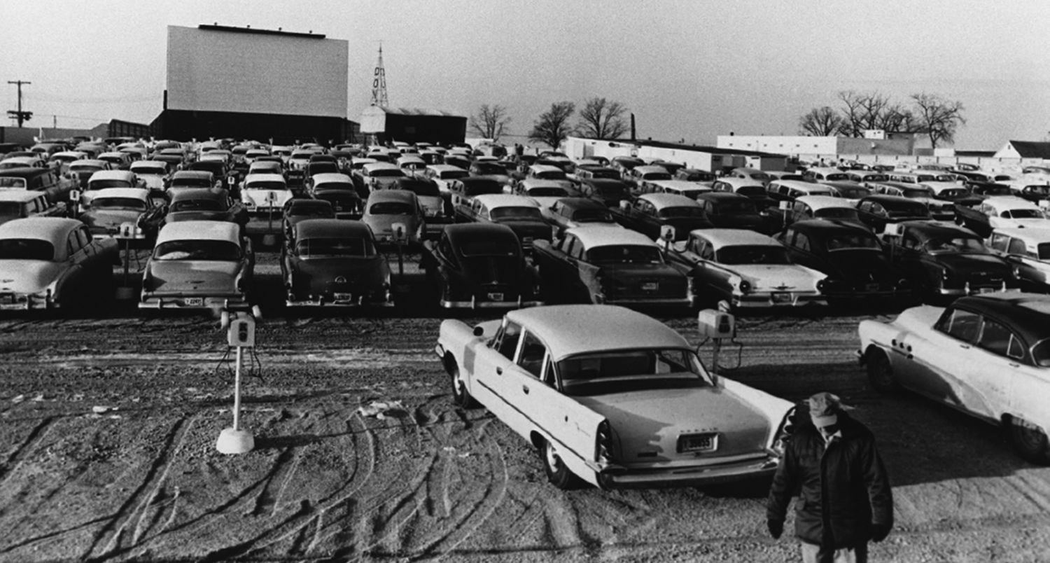 Page 61 A packed lot at the Starlight Drive in.jpg